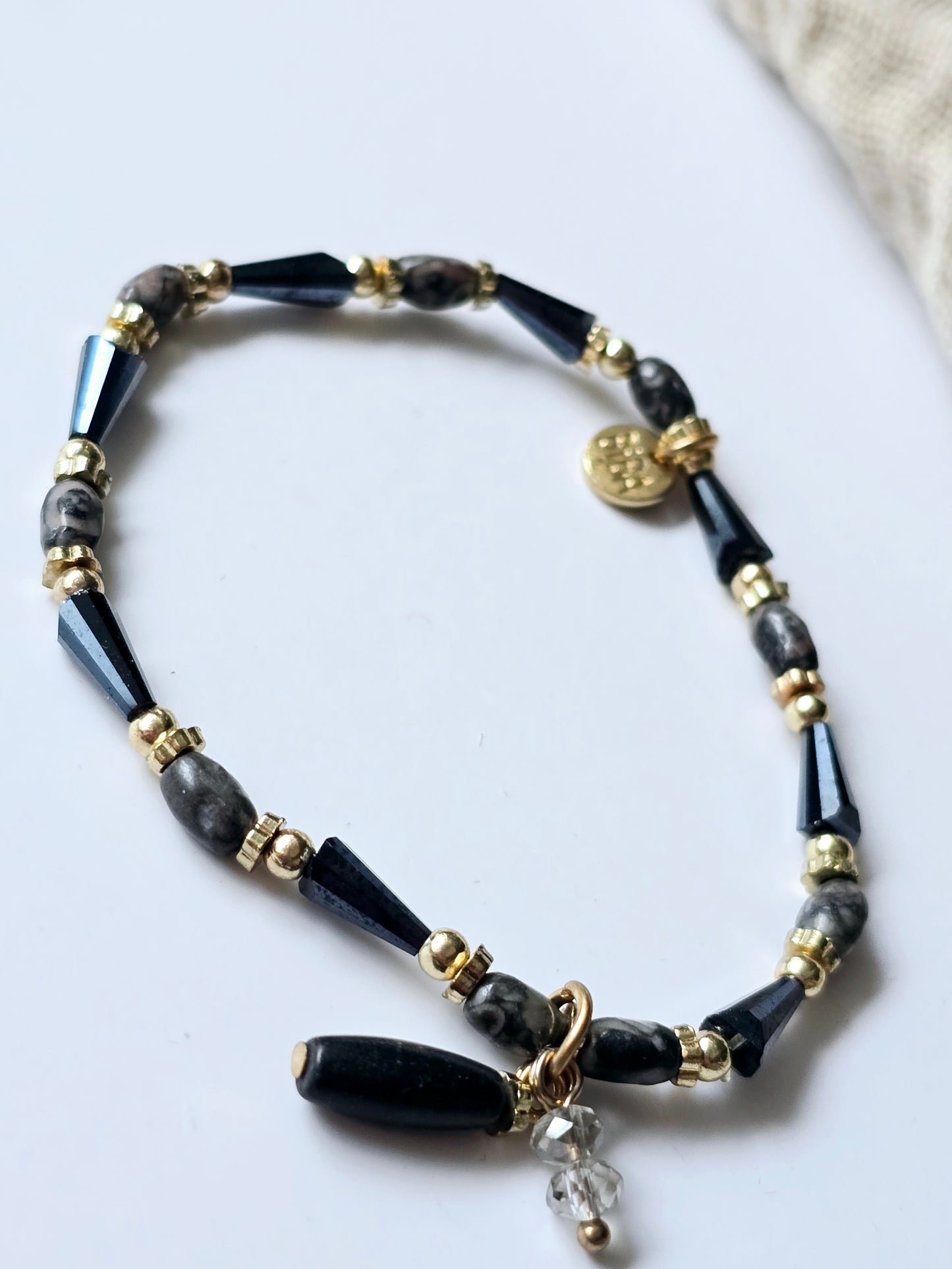 Armband schwarz/gold
