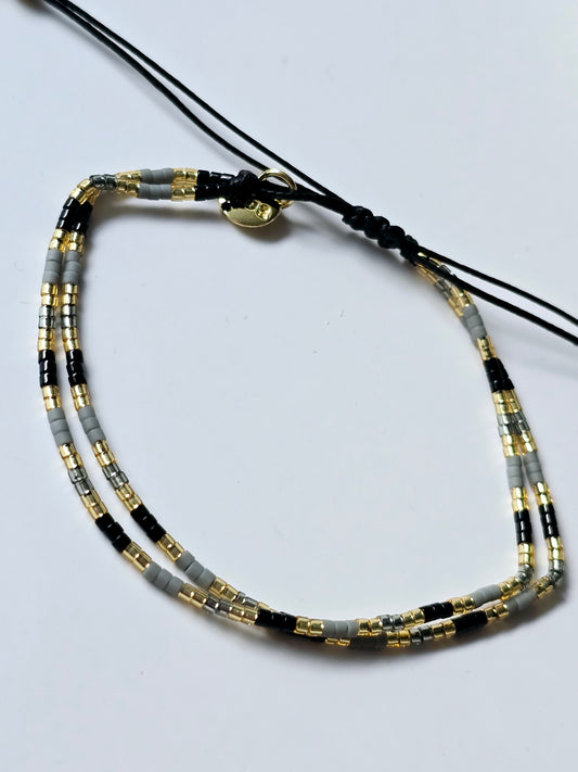 Armband schwarz/grau/gold