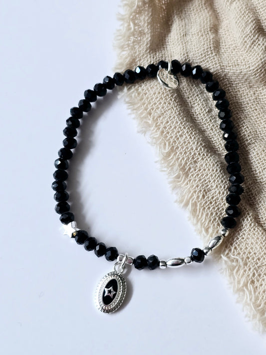 Armband schwarz/silber ovaler Anhänger