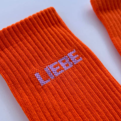 Socken HERR&FRAUHEMPEL Motiv: LIEBE orange (2 Größen)