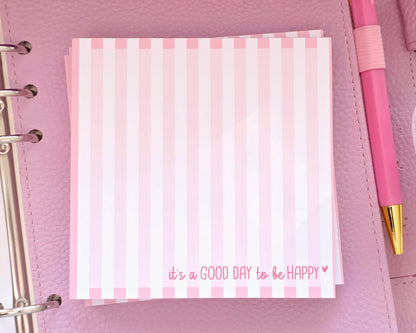 Notizblock "It's a good day to be happy" rosa Streife in 105 x 105 mm
